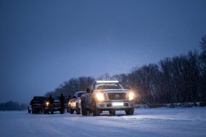 Trucks going ice fishing on Lake Winnipeg