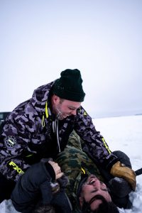 Farmer Will Bergmann and Chef Mandel Hitzer ice fishing on Lake Winnipeg