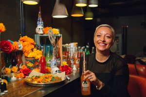 Casie Stewart holds Jarritos Canada's Mandarin Soda