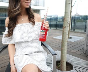 A model hold Jarritos Canada's Fruit Punch Soda