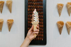 A customer holds a cone of Summer's Ice Cream in Toronto
